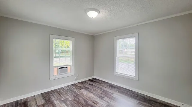 an empty room with windows