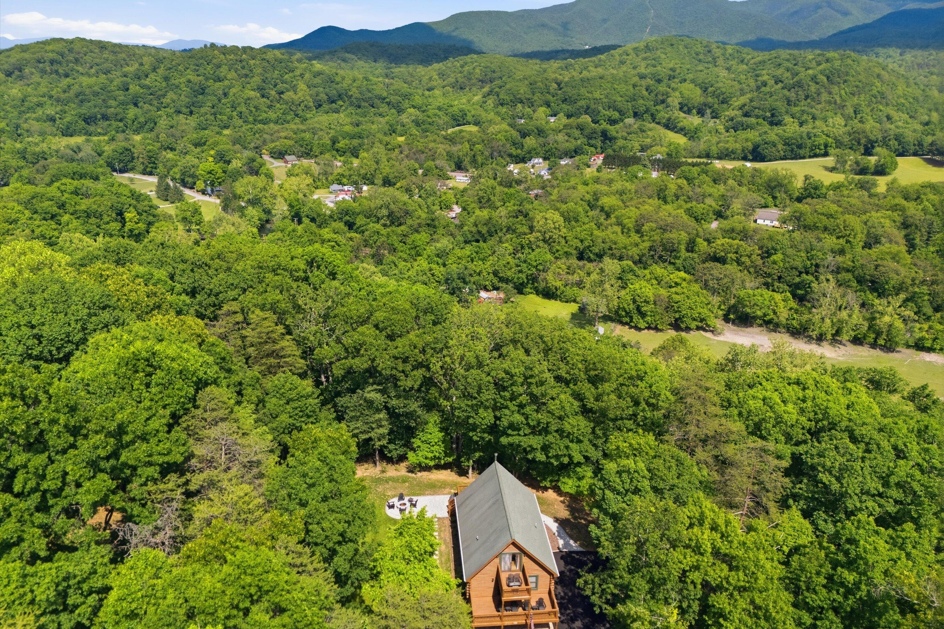 6211 Hillcrest Road Salem, VA 24153 - Photo 5 of 36 an aerial view of a house with a yard
