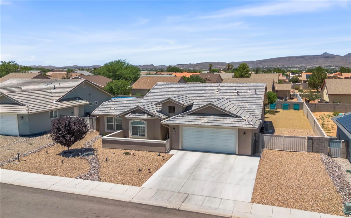 3897 Easy Street Kingman, AZ 86409 - Photo 45 of 53 a front view of a house with a yard