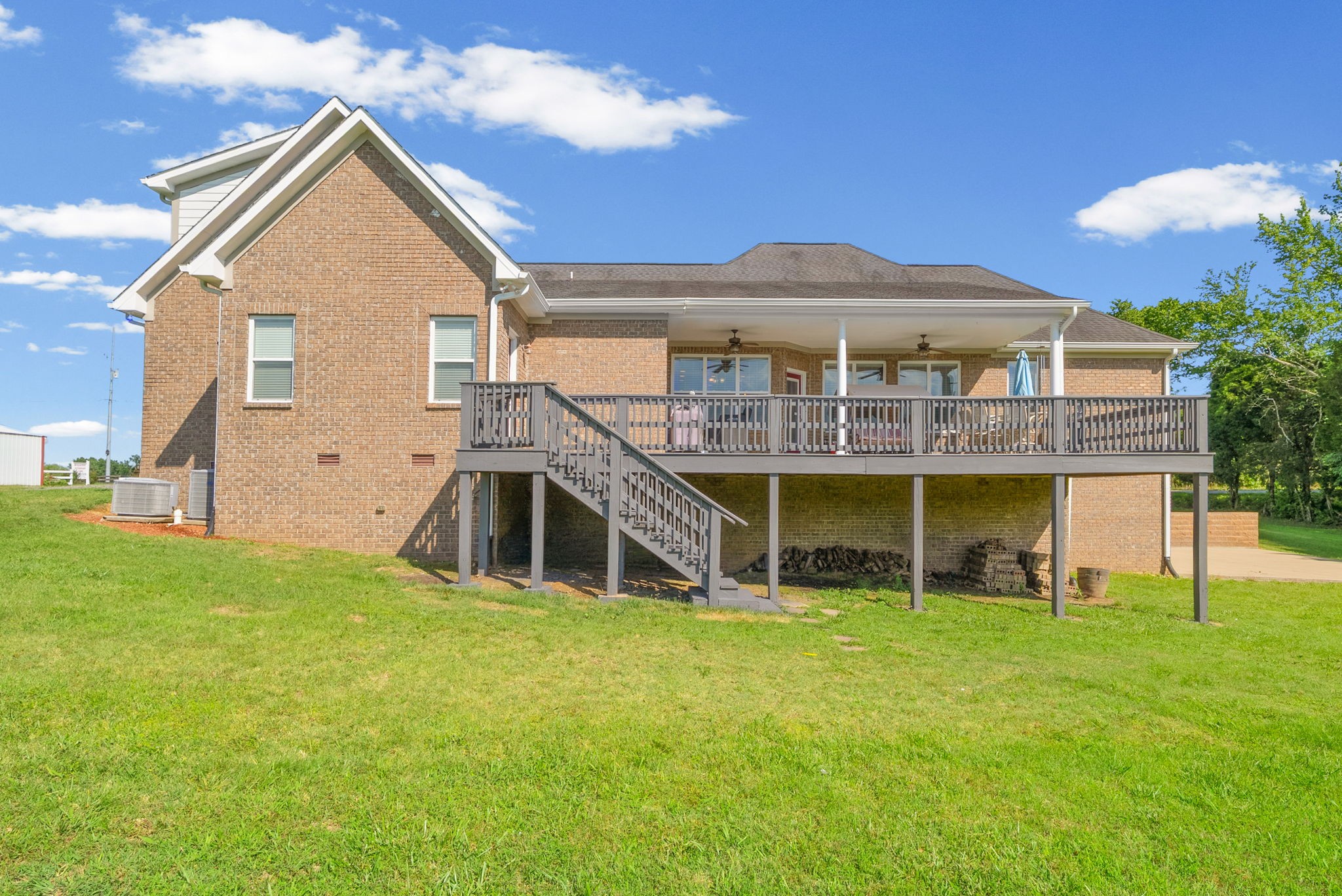 4940 Marion Road Cunningham, TN 37052 - Photo 27 of 43 a view of a house with pool and chairs