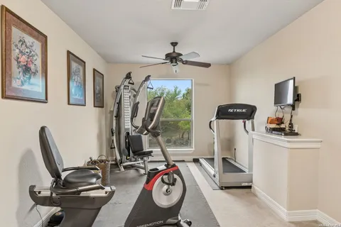 a view of a room with gym equipment
