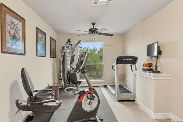 a view of a room with gym equipment