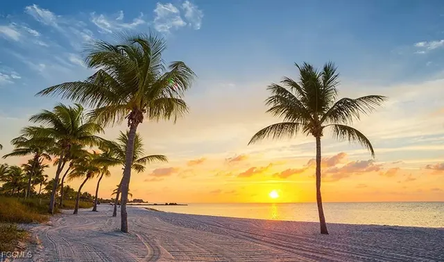 a view of a golf course with a lake