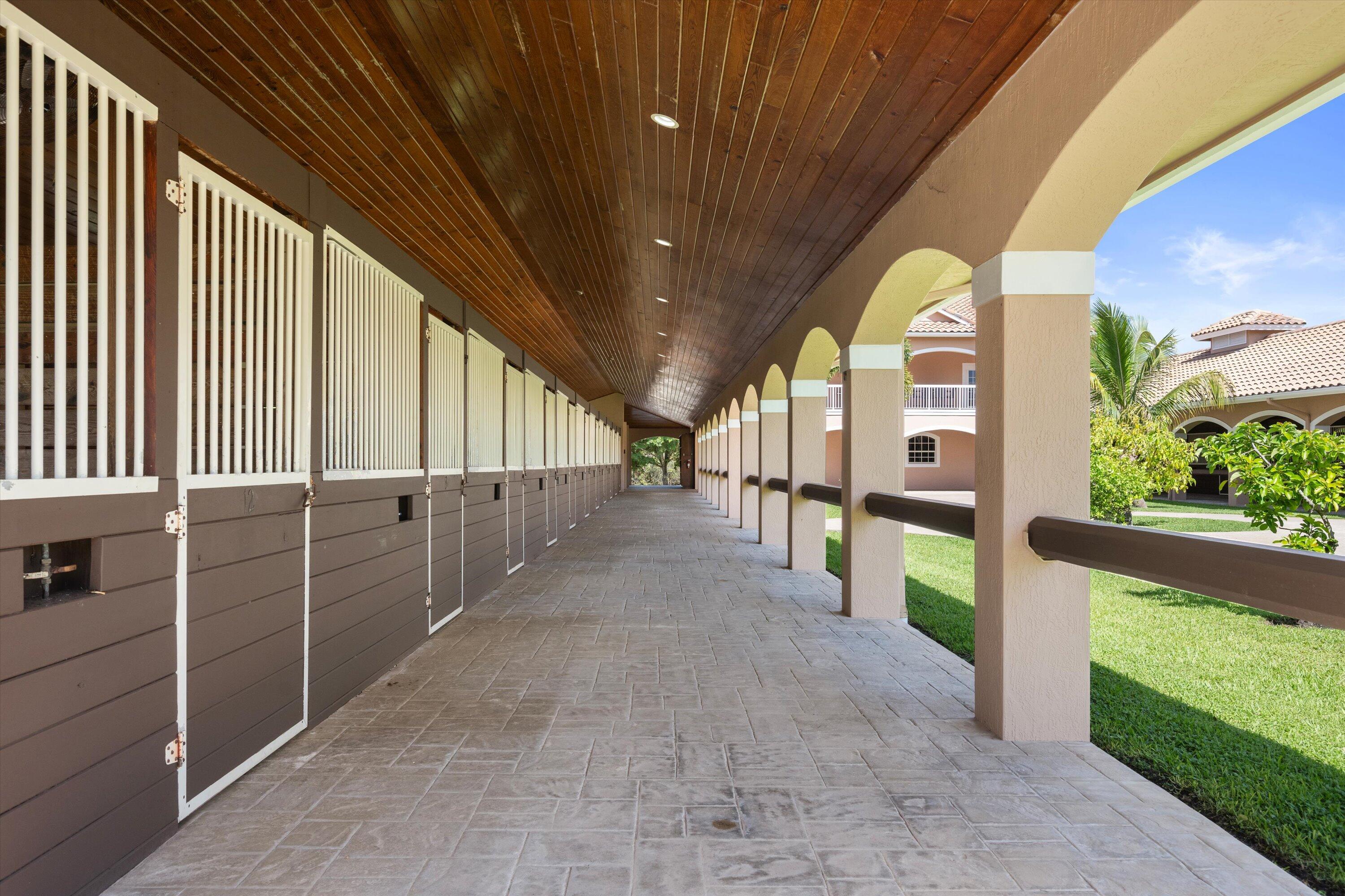 3287 Grande Road Loxahatchee, FL 33470 - Photo 19 of 126 a view of a porch
