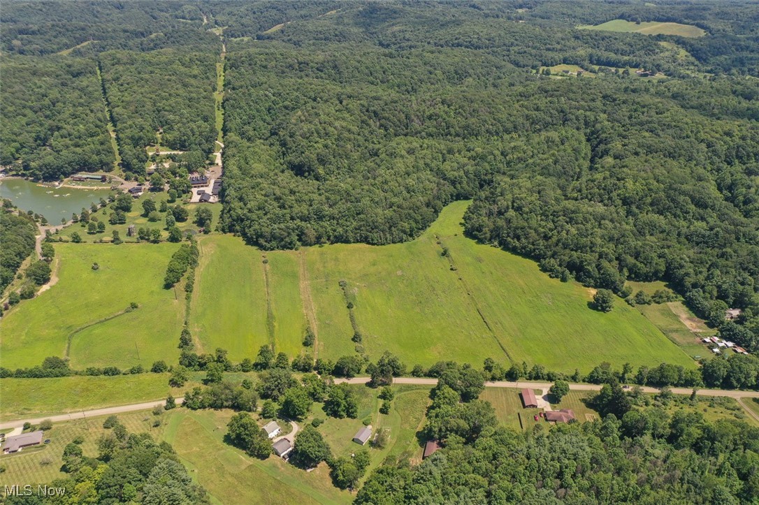 1728 Tall Timber Road Northeast New Philadelphia, OH 44663 - Photo 26 of 39 Overview of rural landscape featuring a forest