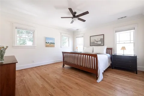 a bed room with a bed and a window