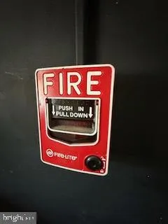 a sign that is on the side of the wall