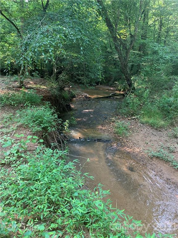 1195 Lambert Road Hiddenite, NC 28636 - Photo 1 of 3 a view of outdoor space and trees