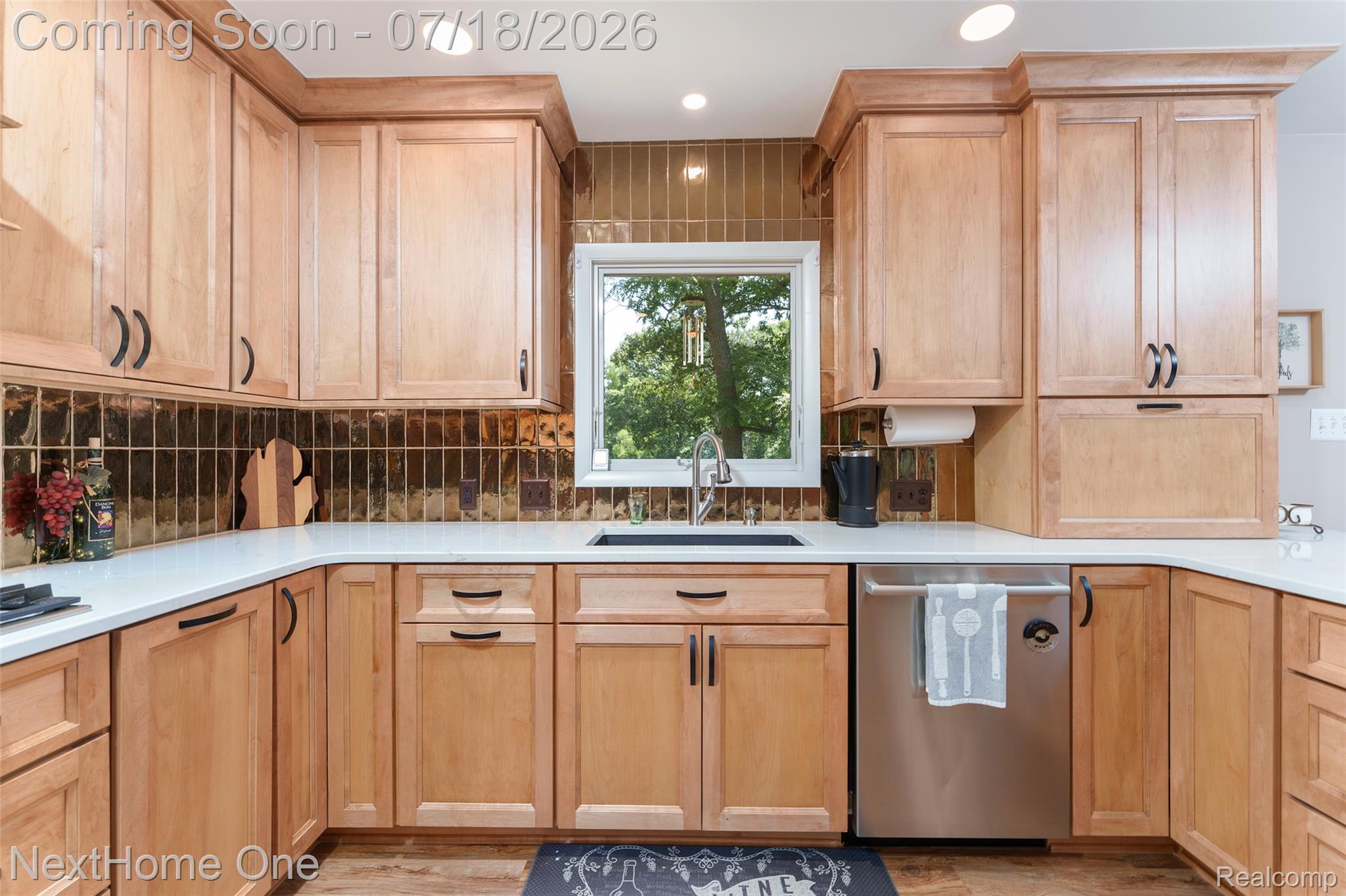 4423 Mason Road Howell, MI 48843 - Photo 7 of 29 Stainless steel appliances and recessed LED lighting bring efficiency to this kitchen.