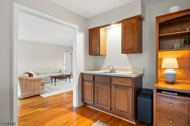 a spacious bathroom with a double vanity sink and a mirror