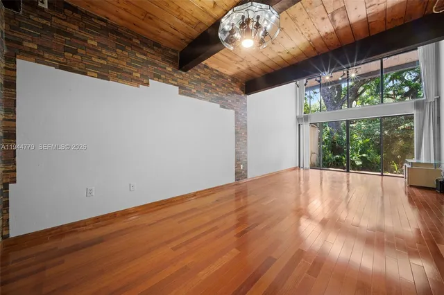 a kitchen with a stove and a refrigerator