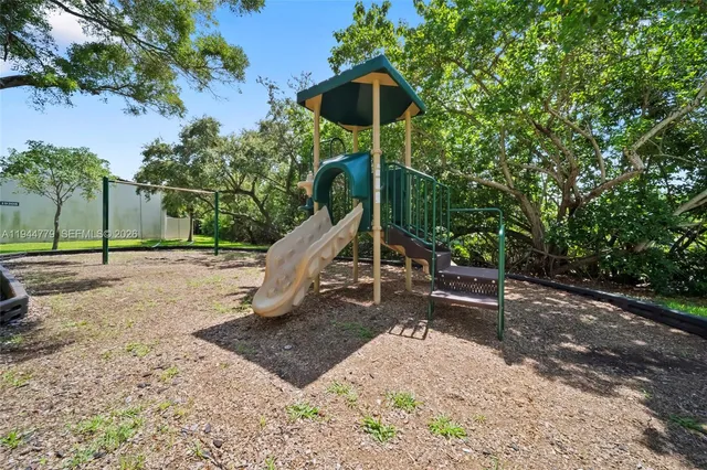 a view of two chairs in a balcony