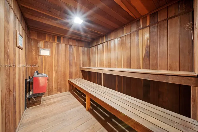 a view of a swimming pool with a yard