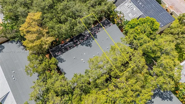 a picture of a bench in front of a window