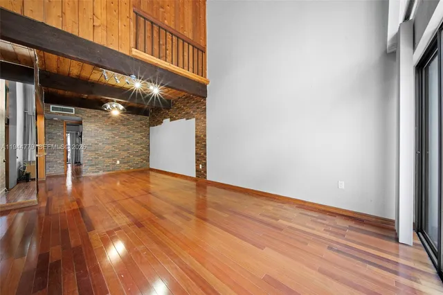 a view of large kitchen with a large window