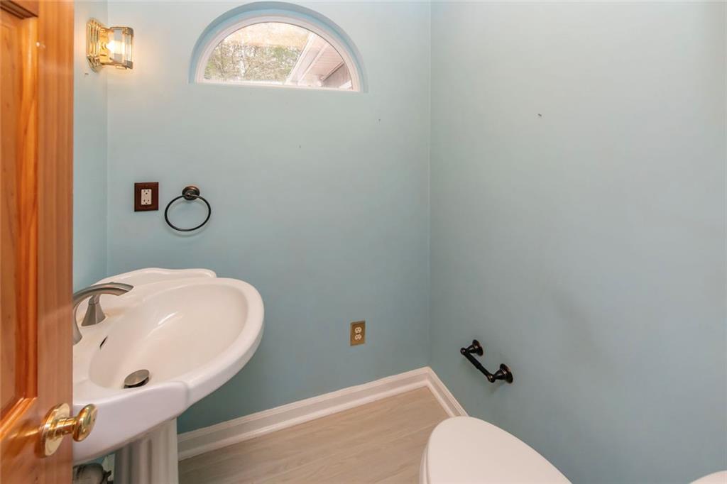 3819 Mason Creek Road Winston, GA 30187 - Photo 20 of 52 a bathroom with a toilet and a sink