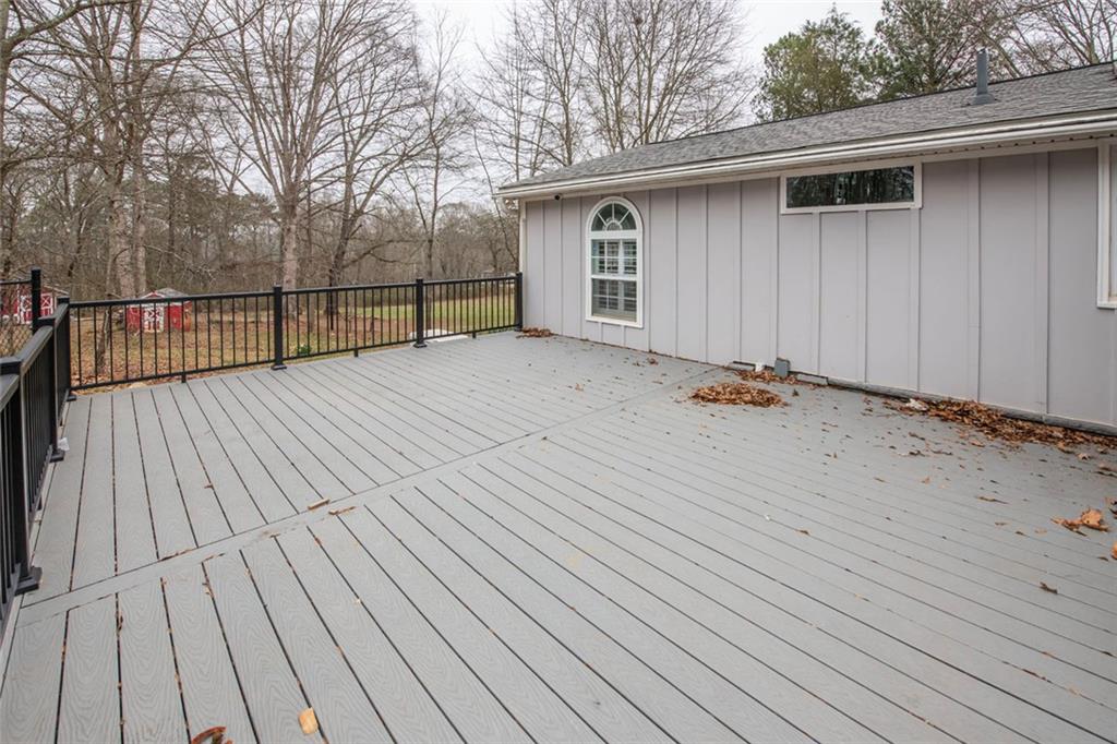 3819 Mason Creek Road Winston, GA 30187 - Photo 27 of 52 a view of backyard with a deck