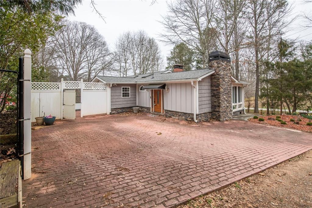 3819 Mason Creek Road Winston, GA 30187 - Photo 4 of 52 a view of a house with a yard and garage