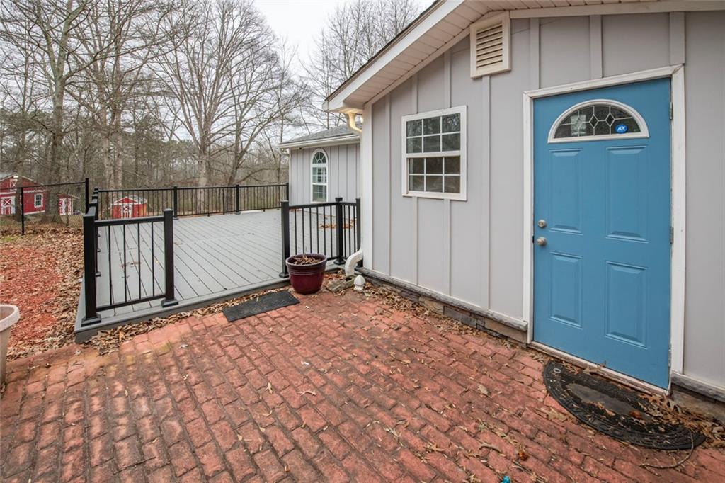 3819 Mason Creek Road Winston, GA 30187 - Photo 43 of 52 a view of a front door and a yard
