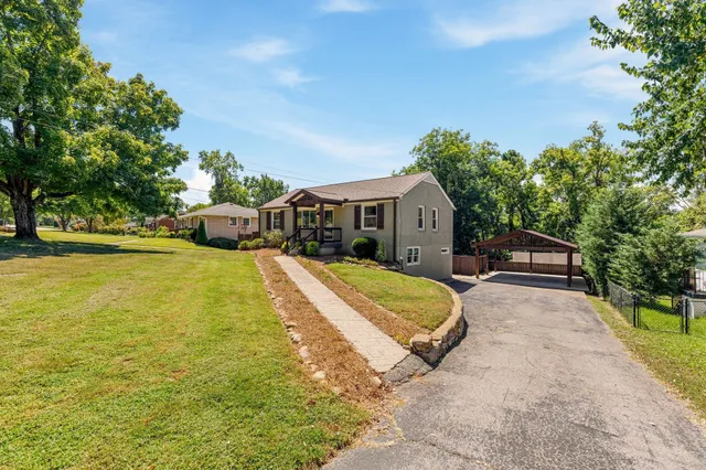 a swimming pool view with a outdoor seating