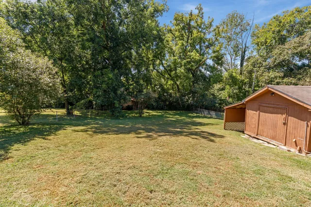 a view of a backyard with a garden