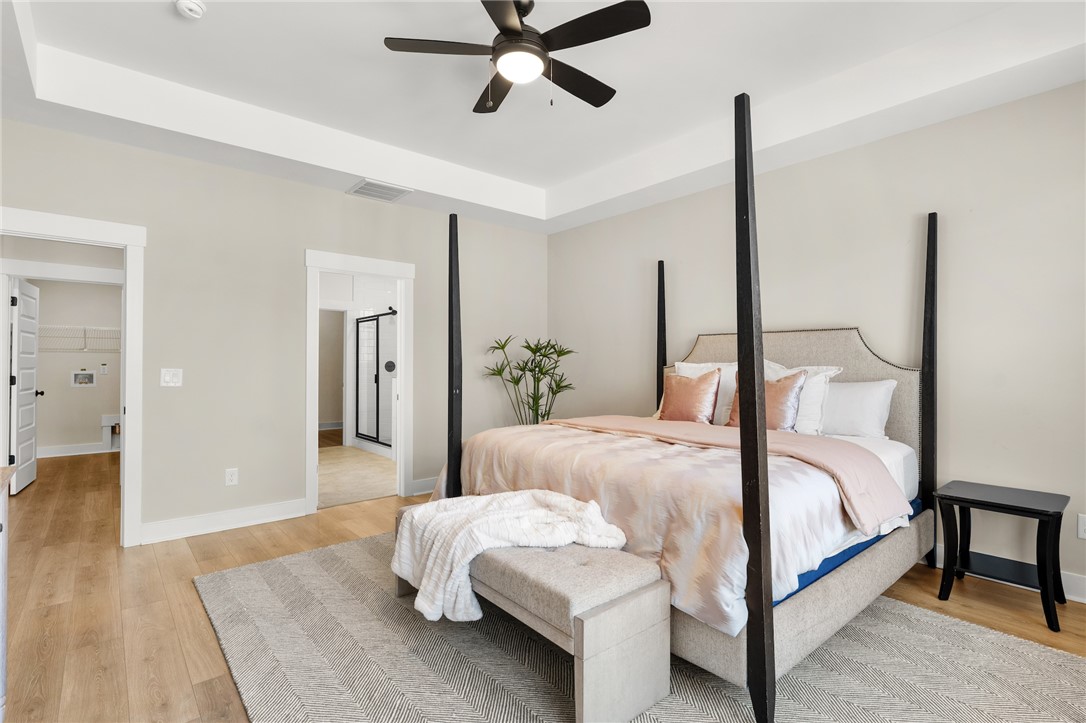 334 Summerall Drive Anderson, SC 29621 - Photo 3 of 28 This spacious primary bedroom offers comfort and direct access to a private bathroom.