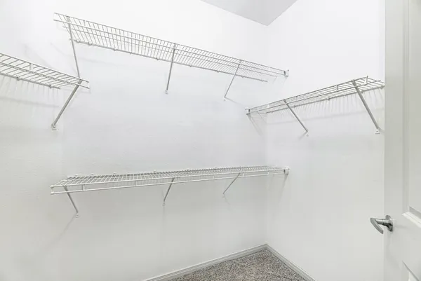 a view of a room with racks on the wall
