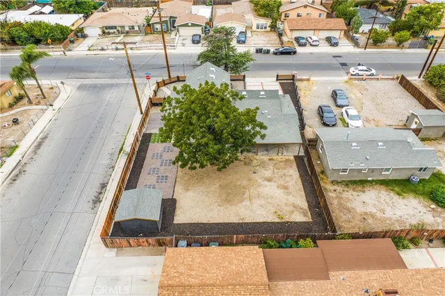 a view of a hallway with a small space and a chandelier fan