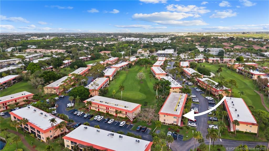 1941 Southwest Palm City Road, Unit B Stuart, FL 34994 - Photo 26 of 40 an aerial view of residential houses with outdoor space