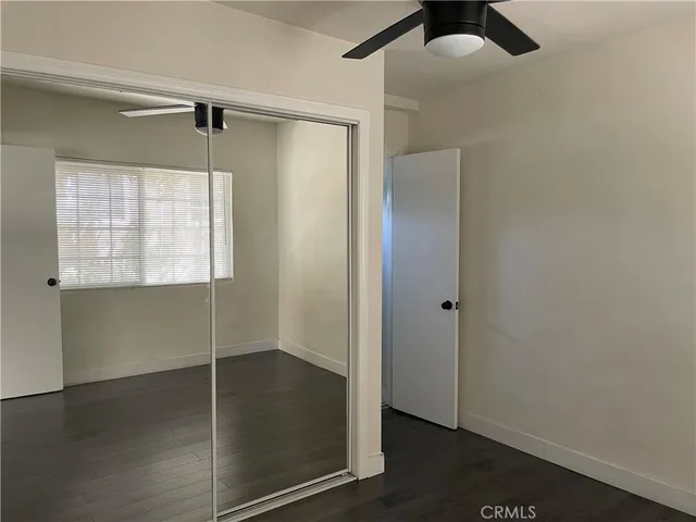 a bathroom with a sink a toilet and a vanity