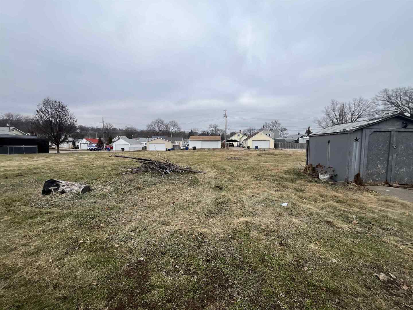 3302 Rockingham Road Davenport, IA 52802 - Photo 34 of 35 a view of a dry yard with wooden fence