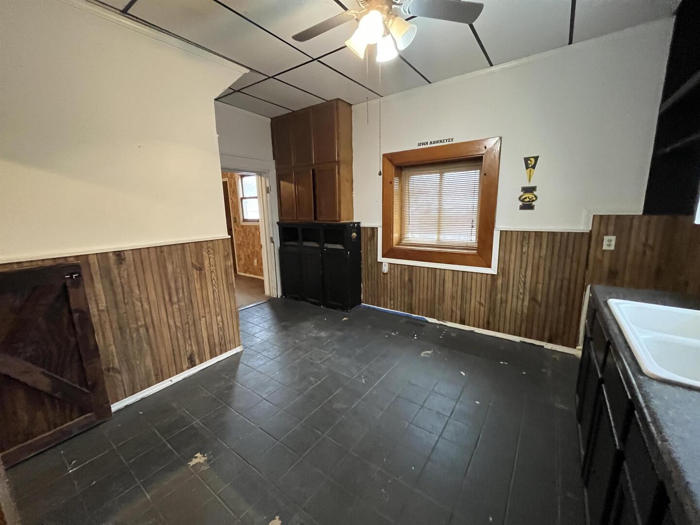 3302 Rockingham Road Davenport, IA 52802 - Photo 10 of 35 a view of an empty room with a window