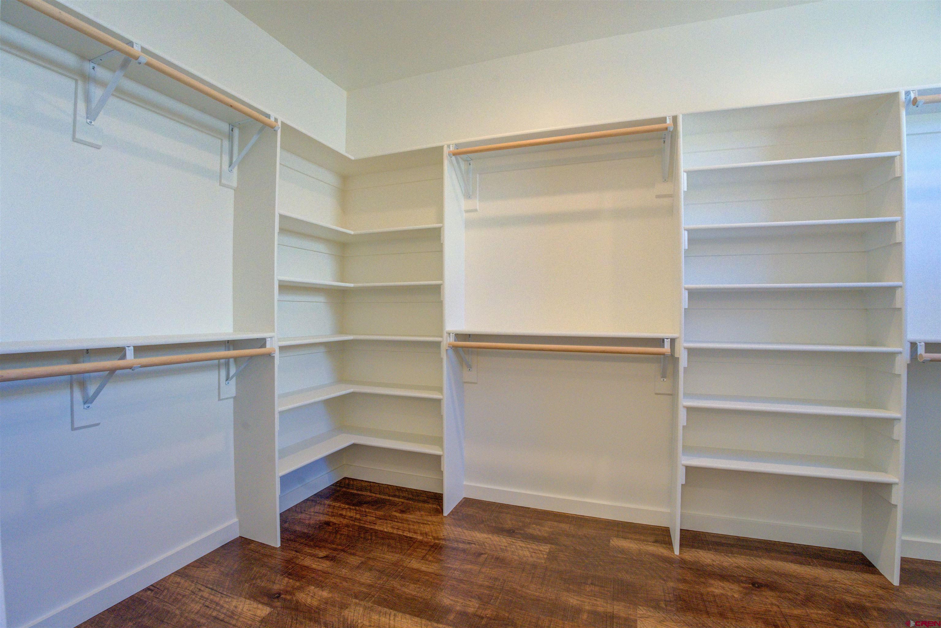 1678 Golf Course Lane Cortez, CO 81321 - Photo 13 of 28 a view of walk in closet with empty racks