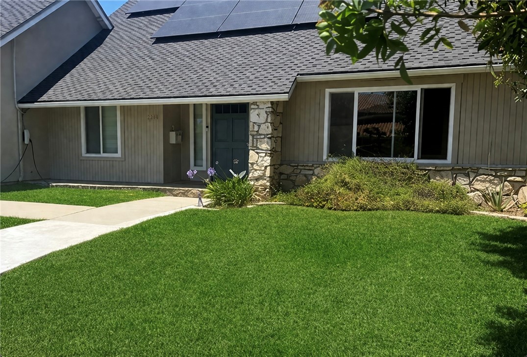 a view of a house with garden