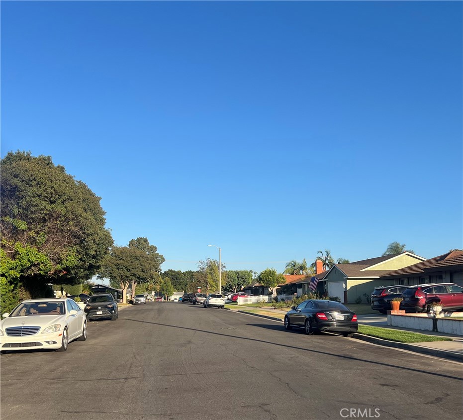 1331 Sao Paulo Avenue Placentia, CA 92870 - Photo 15 of 18 a view of road with card parked on side and retail shops