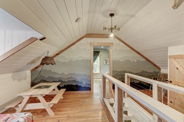 a view of a entryway with wooden floor