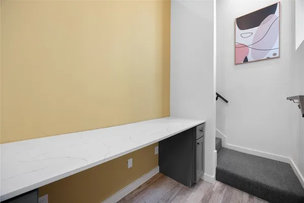 a room with storage and white walls