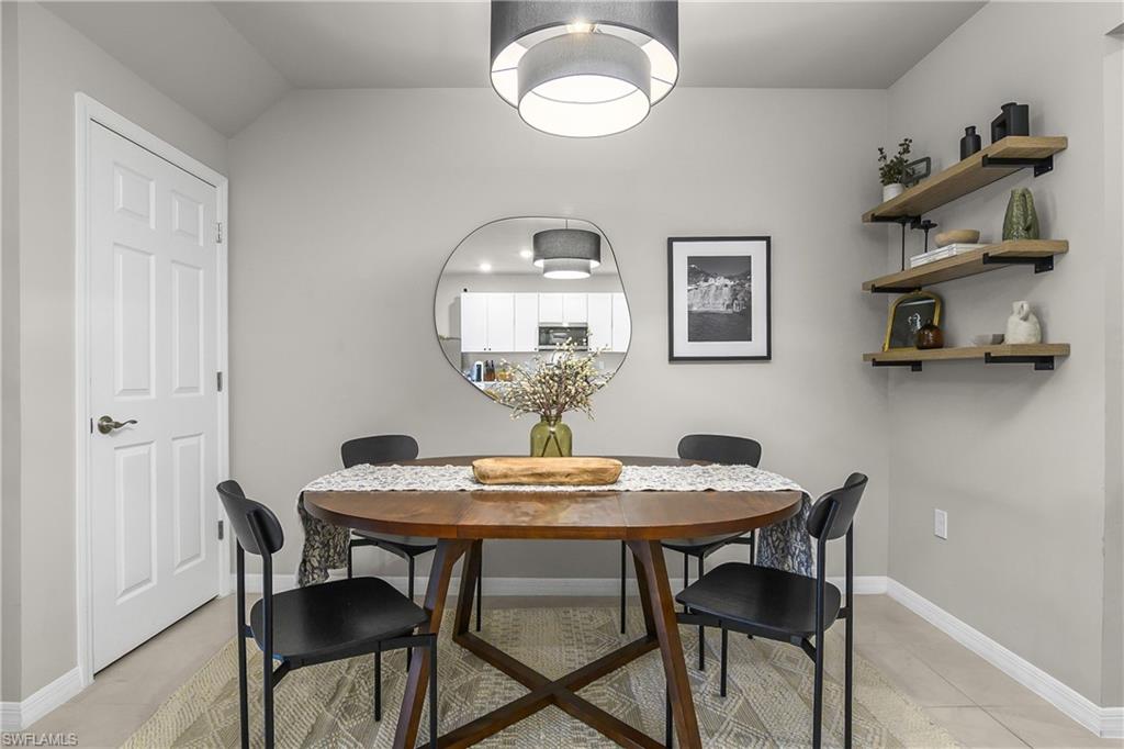 15436 Wildflower Circle Naples, FL 34119 - Photo 11 of 42 Dining room with baseboards