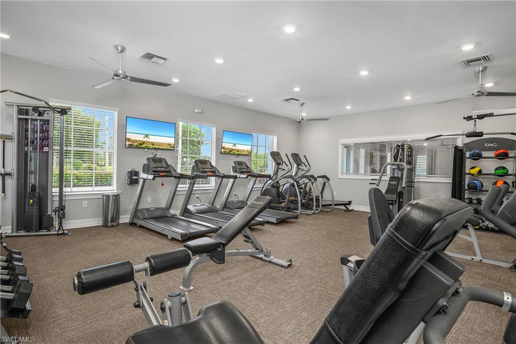 15436 Wildflower Circle Naples, FL 34119 - Photo 32 of 42 Workout area with a ceiling fan and recessed lighting