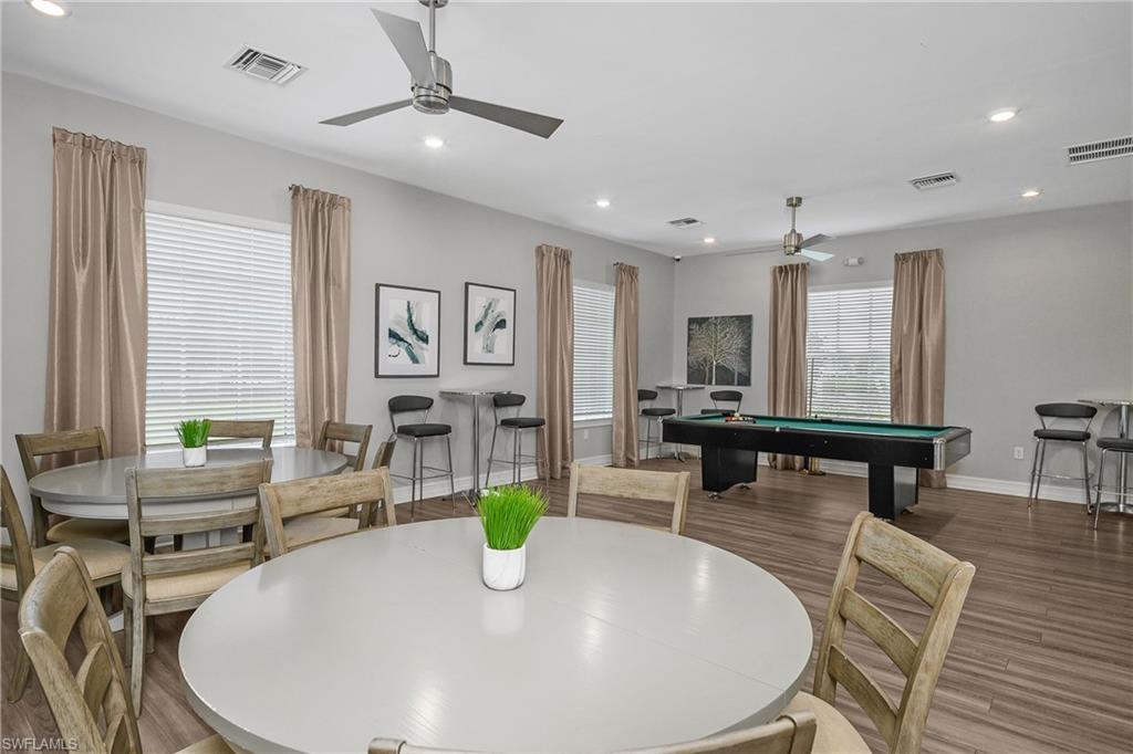 15436 Wildflower Circle Naples, FL 34119 - Photo 34 of 42 Dining room featuring billiards, wood finished floors, recessed lighting, and ceiling fan