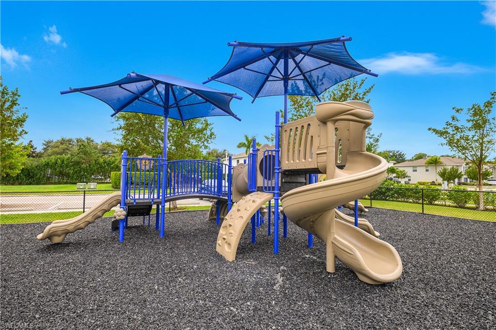 15436 Wildflower Circle Naples, FL 34119 - Photo 39 of 42 View of communal playground