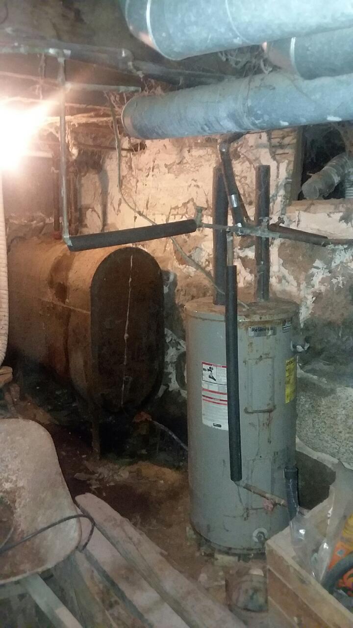 460 Carthage Road Carthage, ME 04224 - Photo 29 of 29 Hot water tank and oil tank