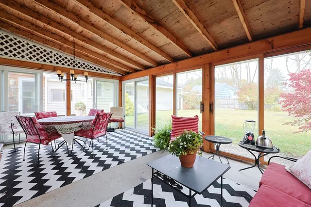 a outdoor space with furniture and wooden floor