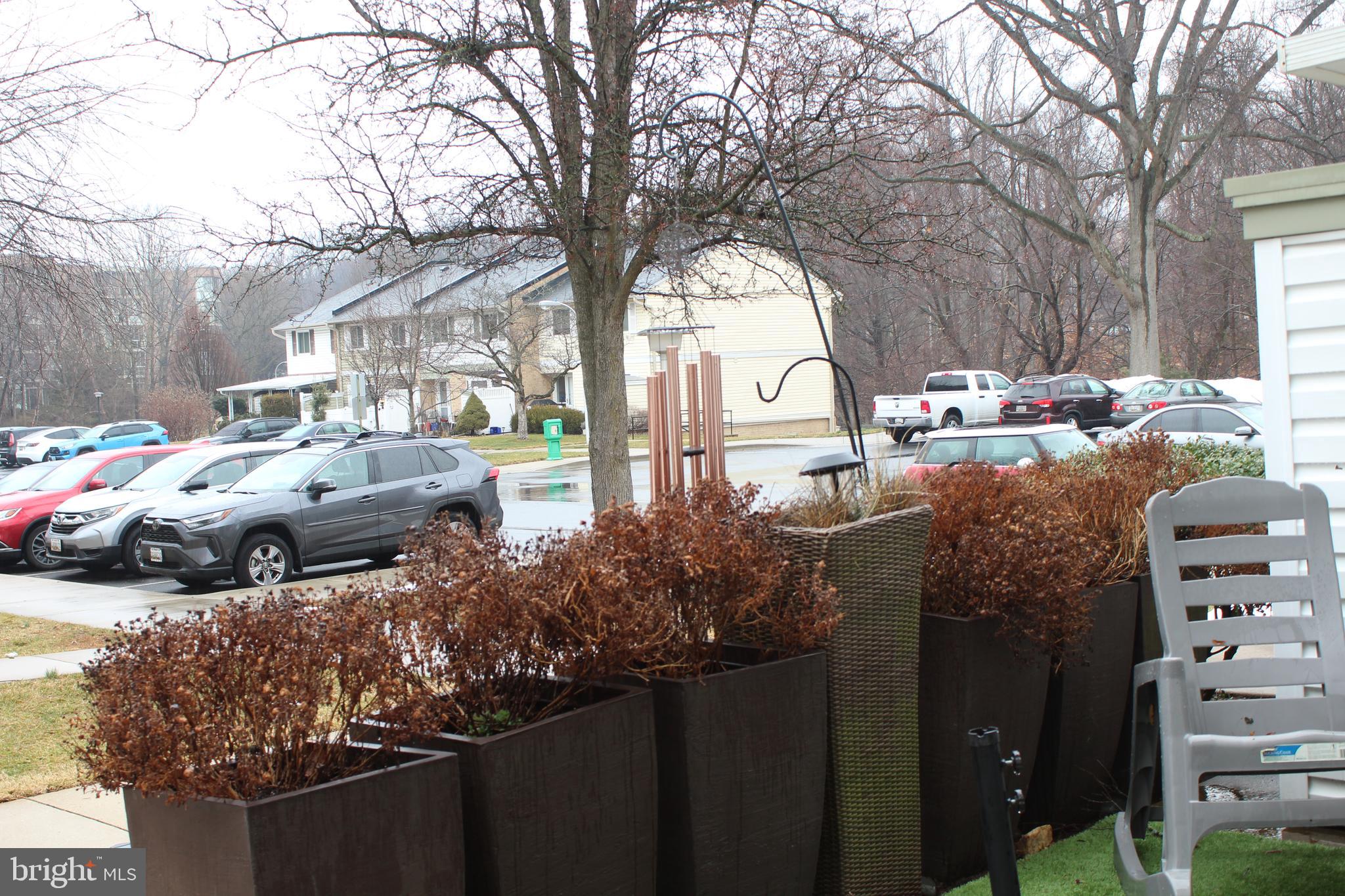 15002 Eardley Court, Unit 282B Silver Spring, MD 20906 - Photo 22 of 28 a couple of cars parked in front of a house
