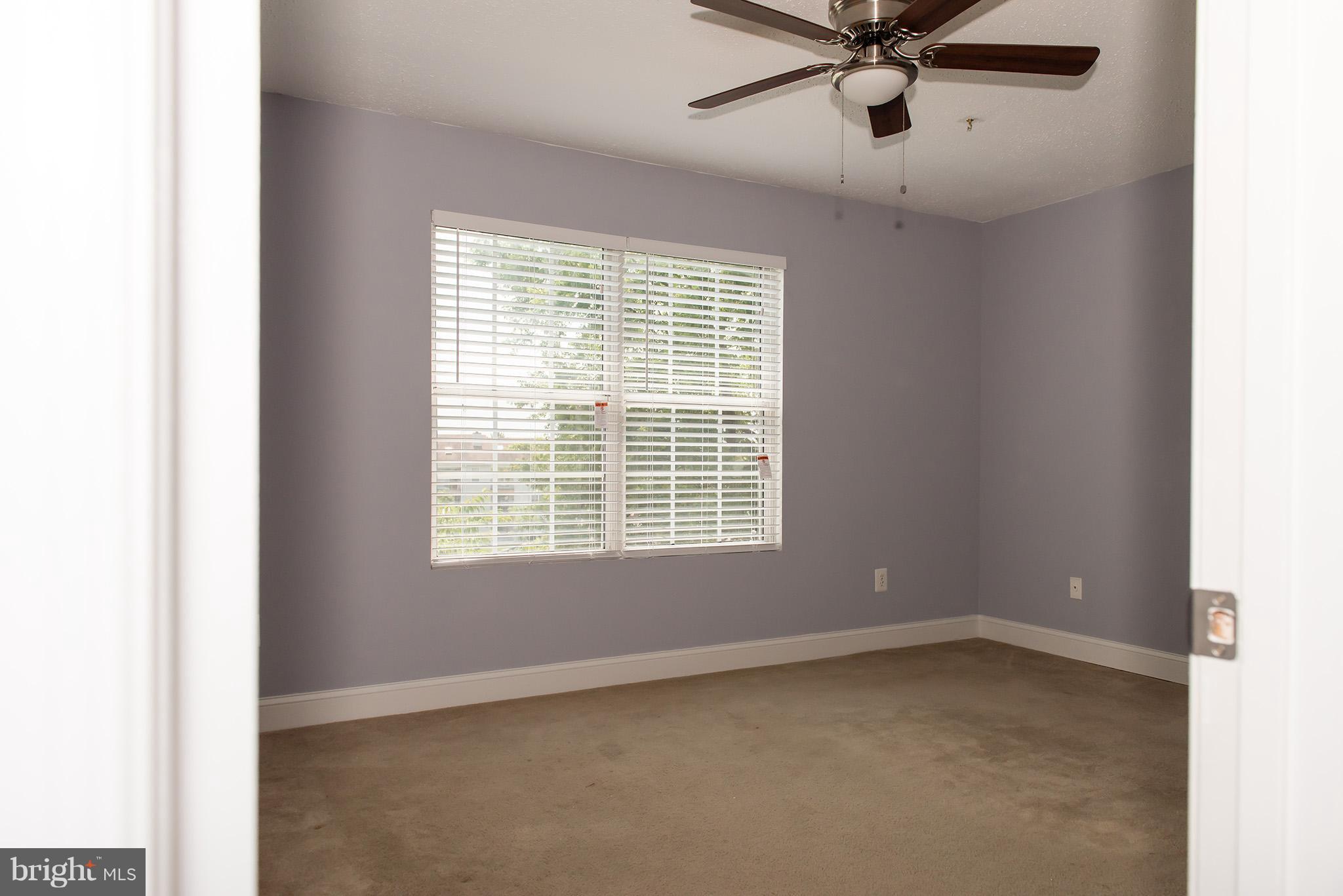 110 Fort Evans Road Southeast, Unit E Leesburg, VA 20175 - Photo 8 of 14 Bedroom (Master) is roomy with a picture window