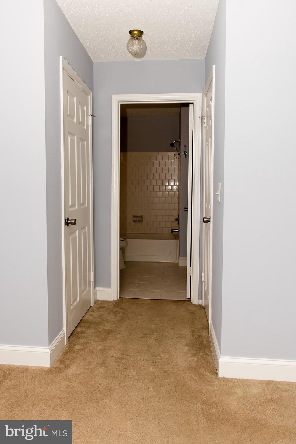 110 Fort Evans Road Southeast, Unit E Leesburg, VA 20175 - Photo 9 of 14 Bedroom (Master)with bathroom and two walk closets
