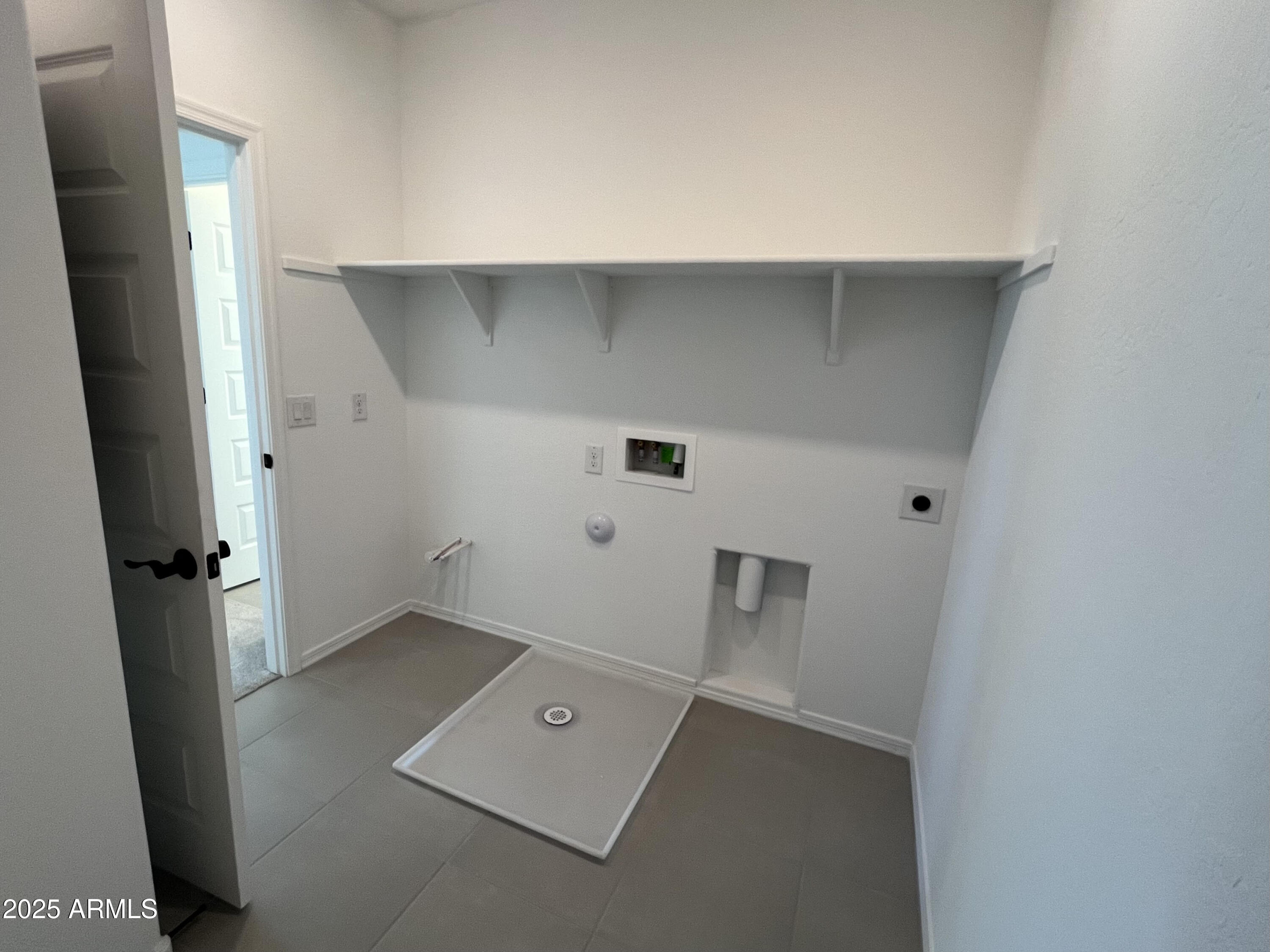 16917 West Jenan Road Surprise, AZ 85388 - Photo 40 of 46 Upstairs laundry