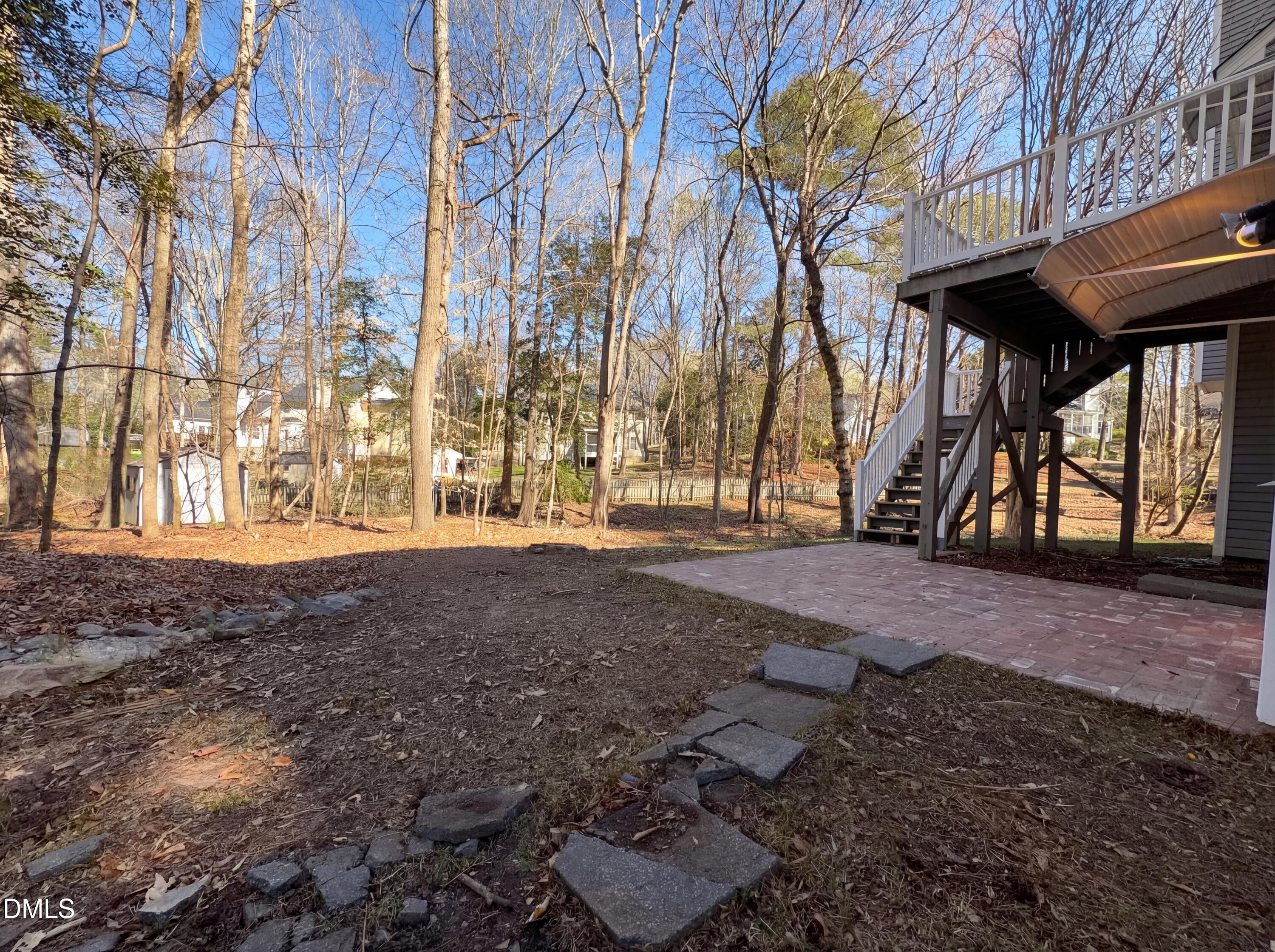 3117 Twatchman Drive Raleigh, NC 27616 - Photo 12 of 27 a view of house with backyard and trees