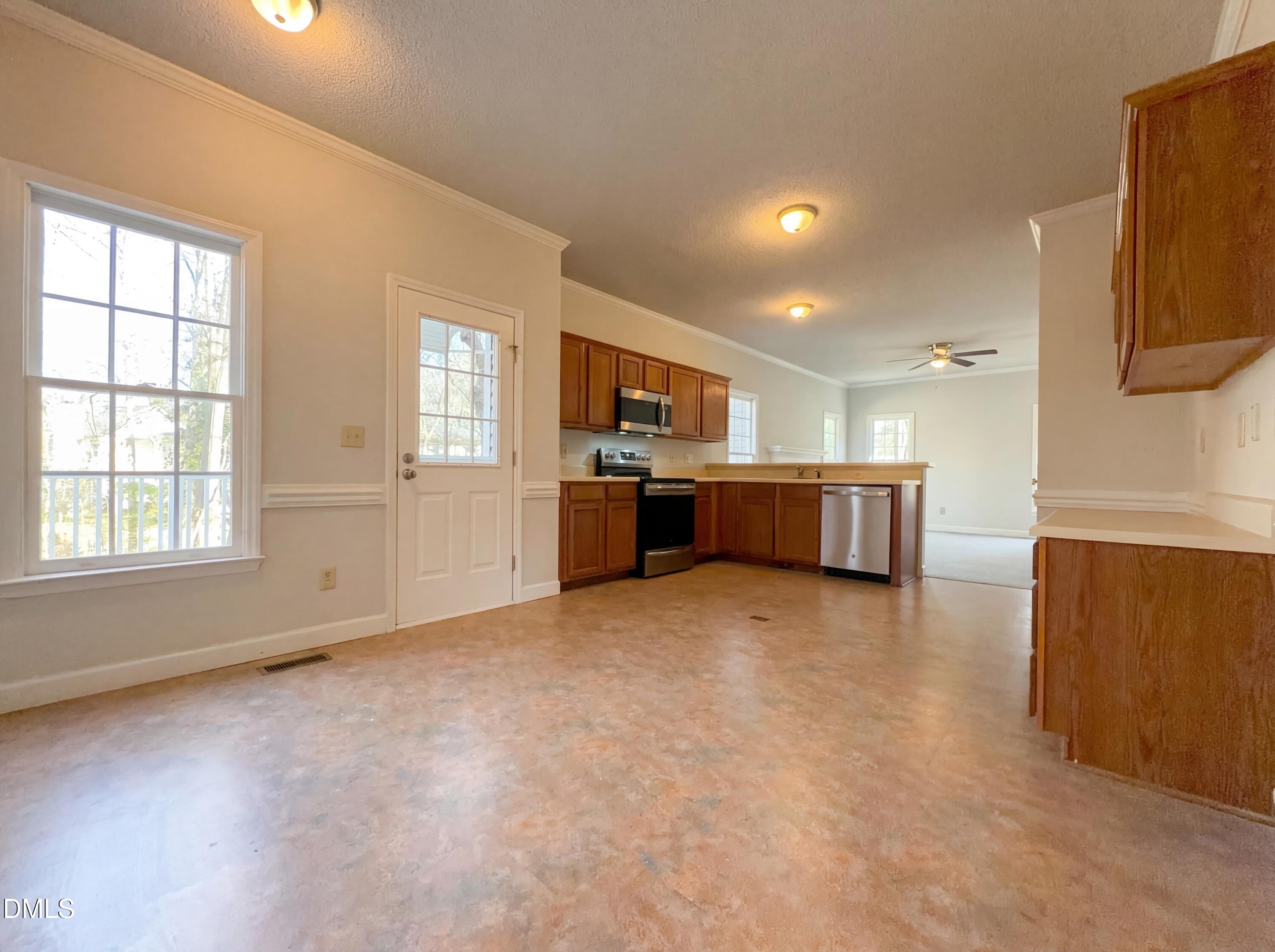 3117 Twatchman Drive Raleigh, NC 27616 - Photo 2 of 27 a view of a kitchen with a sink and cabinets