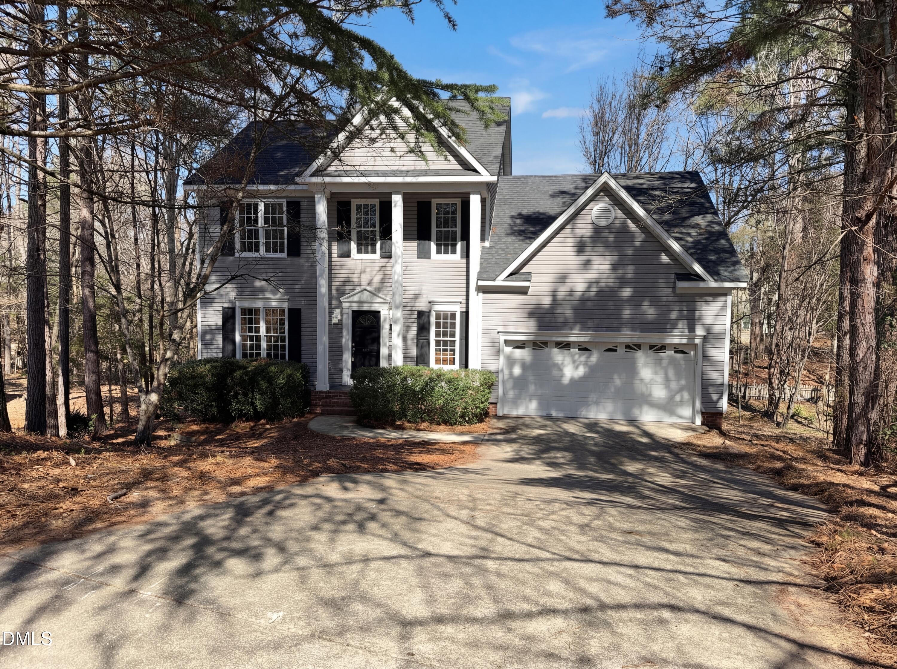 3117 Twatchman Drive Raleigh, NC 27616 - Photo 25 of 27 a front view of a house with a yard